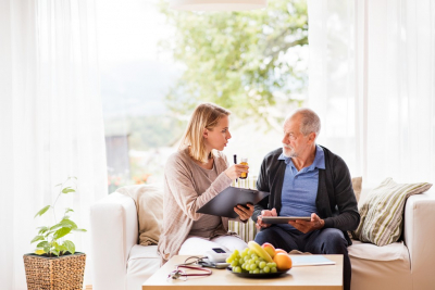 the caregiver and the elderly talking