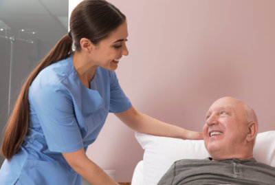 nurse and the elderly smiling